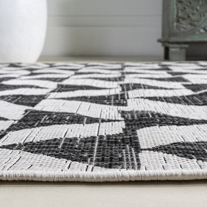 10' Ivory And Black Geometric Indoor Outdoor Runner Rug