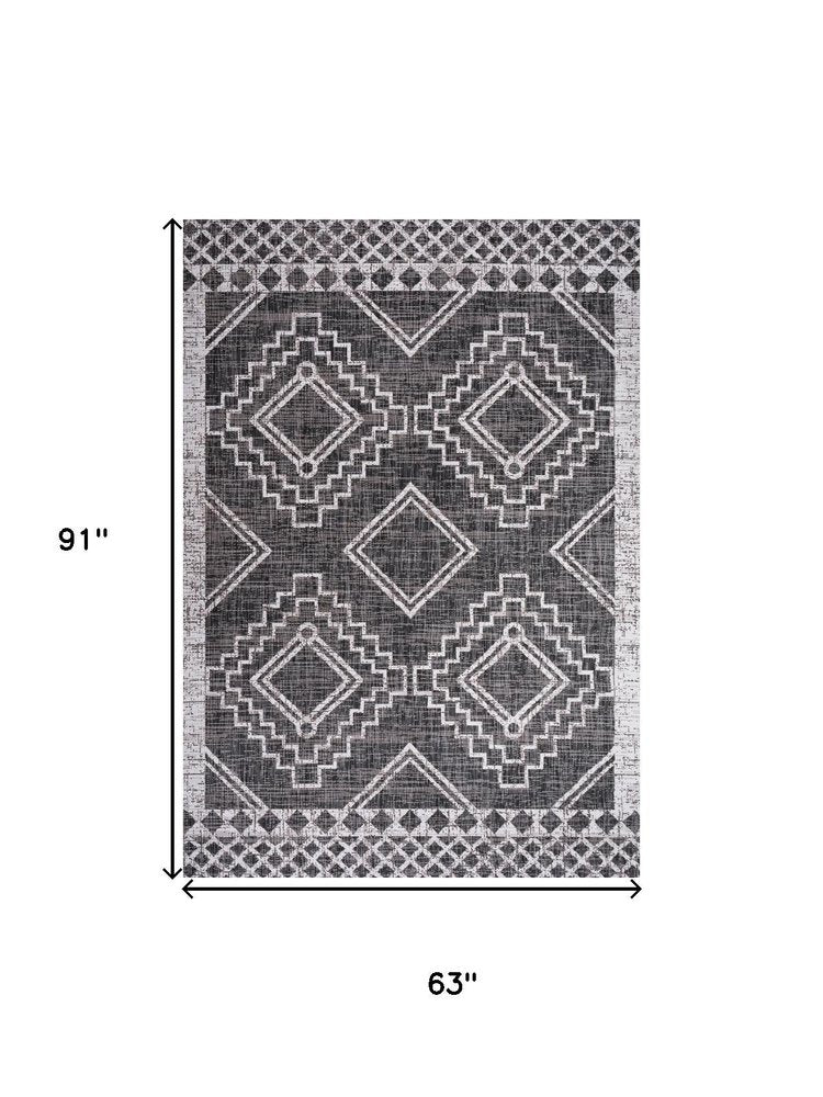 5' X 8' Black And Ivory Moroccan Indoor Outdoor Area Rug HomeRoots