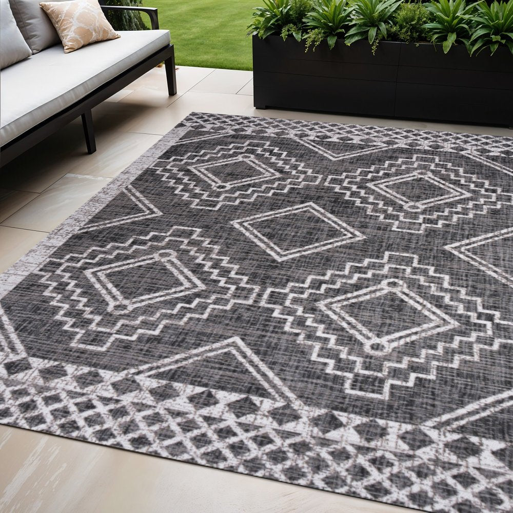 5' X 8' Black And Ivory Moroccan Indoor Outdoor Area Rug — view 3