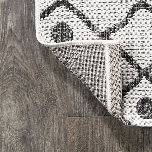 8' Ivory And Black Trellis Indoor Outdoor Runner Rug