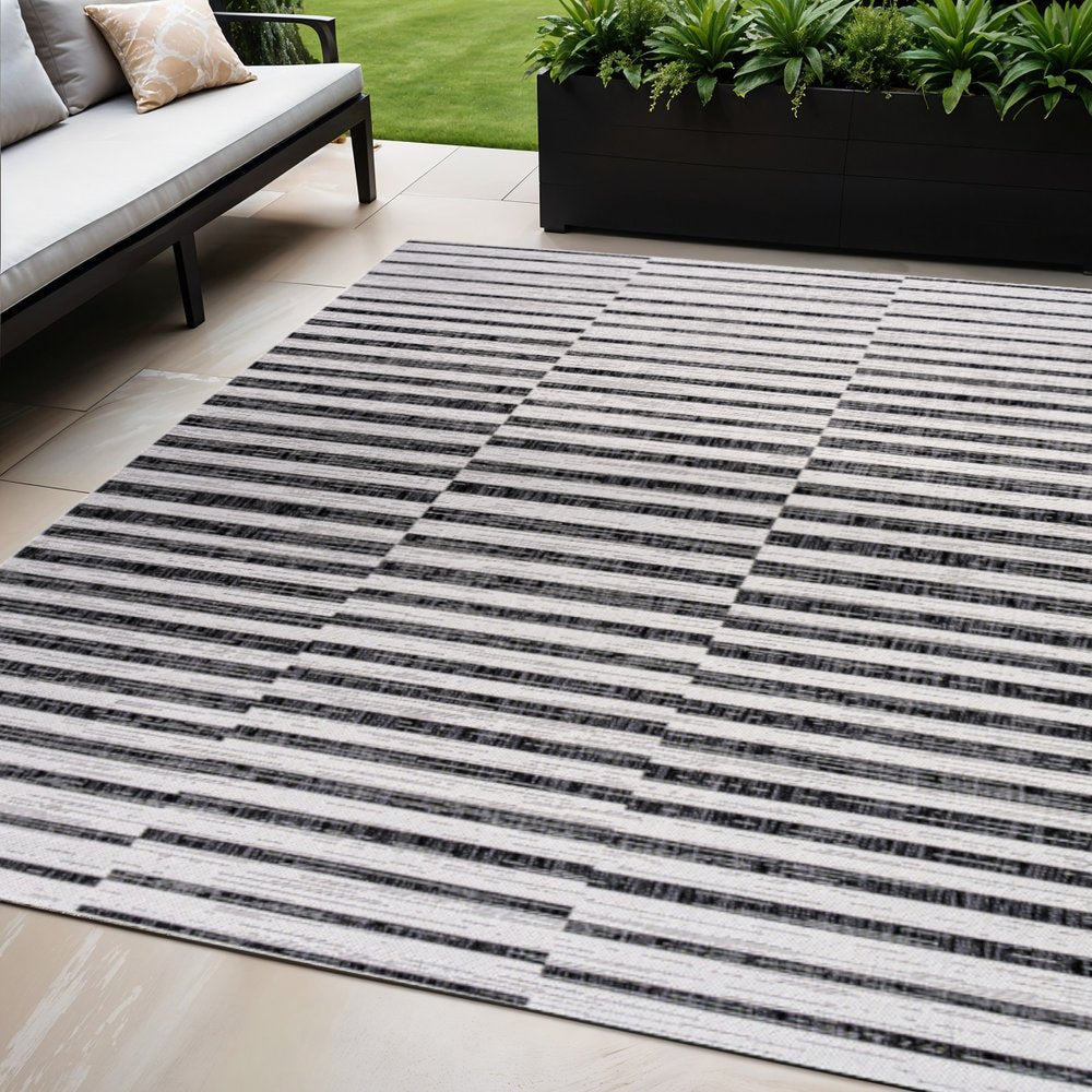 5' X 8' Ivory And Black Striped Indoor Outdoor Area Rug — view 4
