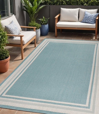 5' X 8' Aqua And Beige Striped Indoor Outdoor Area Rug