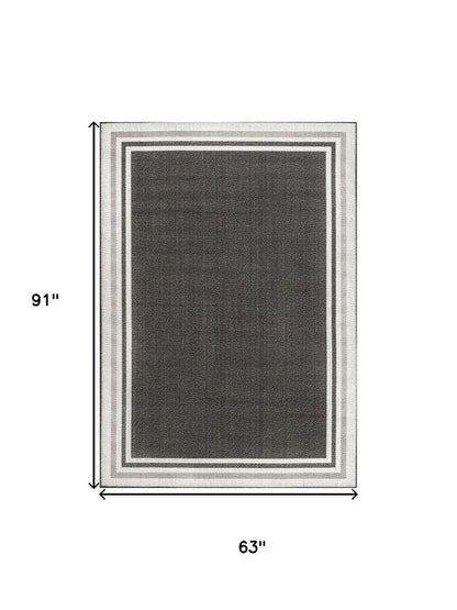 5' X 8' Black And Cream Striped Indoor Outdoor Area Rug