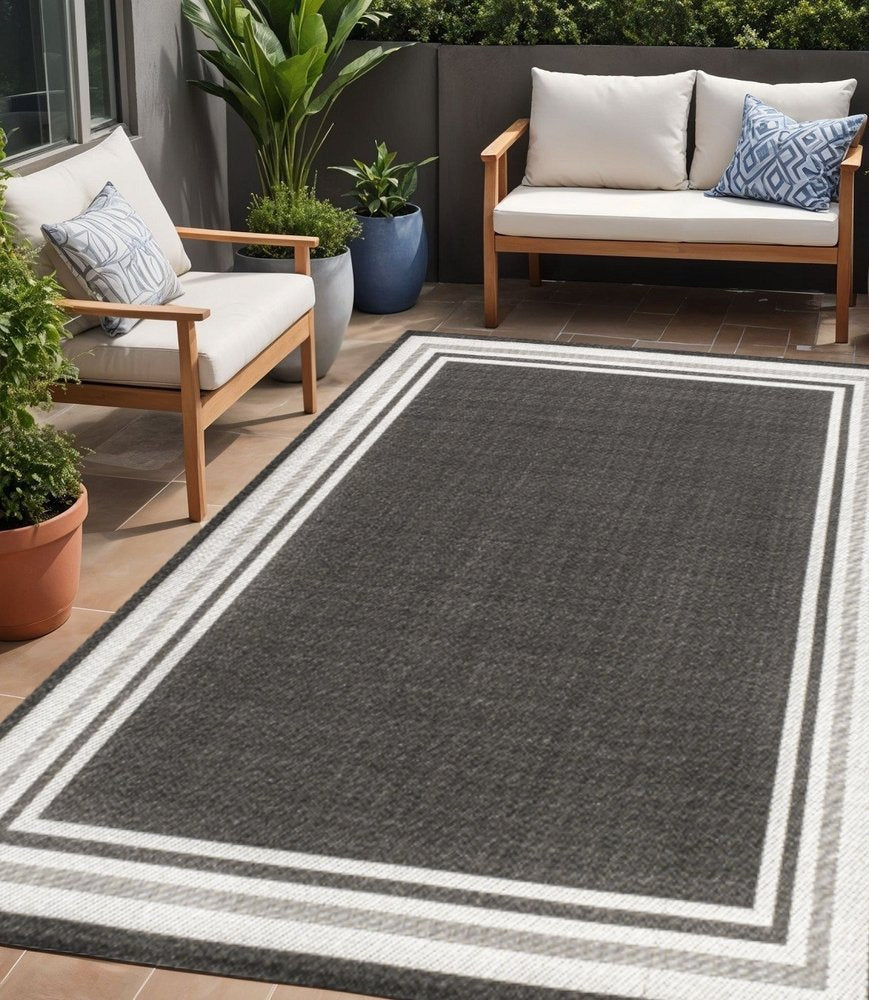 5' X 8' Black And Cream Striped Indoor Outdoor Area Rug — view 5
