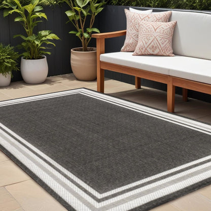 8' X 10' Black And Cream Striped Indoor Outdoor Area Rug HomeRoots