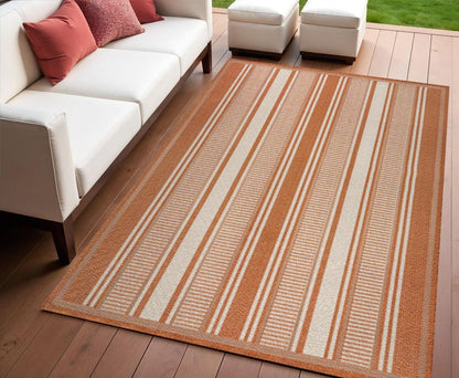 4' X 6' Orange And Cream Striped Indoor Outdoor Area Rug HomeRoots