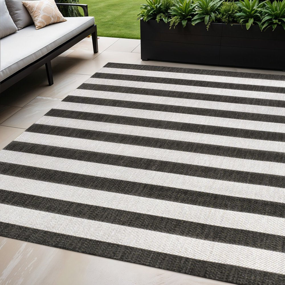5' X 8' Black And Cream Striped Indoor Outdoor Area Rug HomeRoots