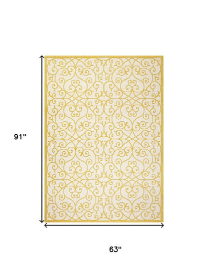 5' X 8' Cream And Yellow Geometric Indoor Outdoor Area Rug HomeRoots