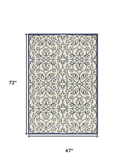 4' X 6' Navy Blue And Beige Geometric Indoor Outdoor Area Rug HomeRoots