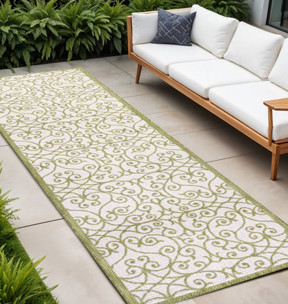 10' Green And Cream Geometric Indoor Outdoor Runner Rug HomeRoots