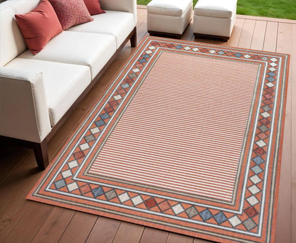4' X 6' Orange And Ivory Geometric Indoor Outdoor Area Rug HomeRoots