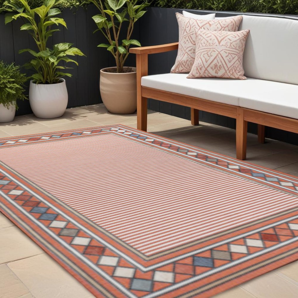 8' X 10' Orange And Ivory Geometric Indoor Outdoor Area Rug HomeRoots