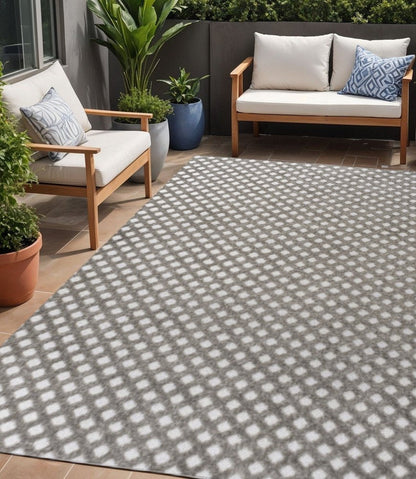 5' X 8' Dark Gray And Ivory Trellis Indoor Outdoor Area Rug