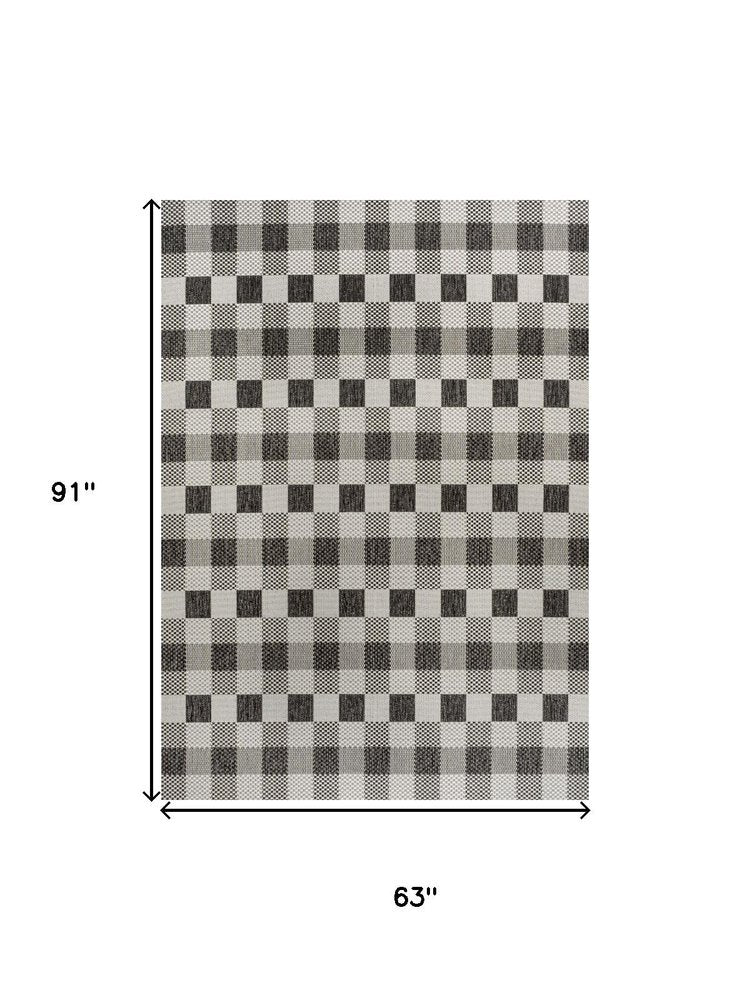 5' X 8' Black And Cream Geometric Indoor Outdoor Area Rug — view 4