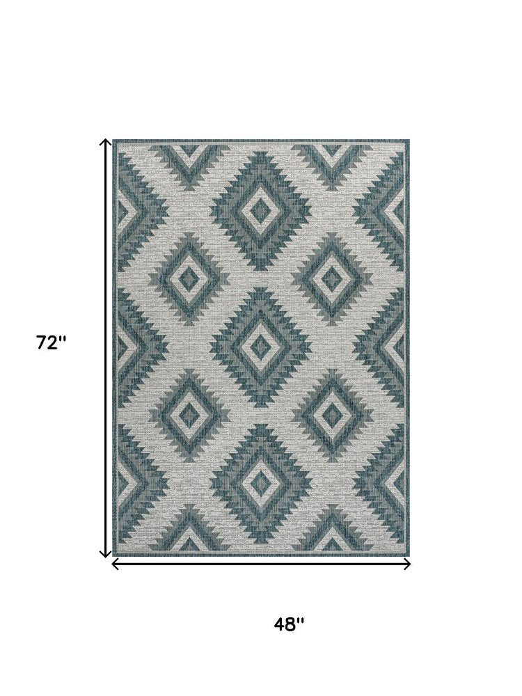 4' X 6' Turquoise And Cream Moroccan Indoor Outdoor Area Rug HomeRoots
