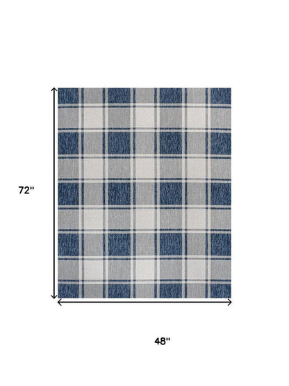 4' X 6' Navy Blue And Cream Gingham Indoor Outdoor Area Rug