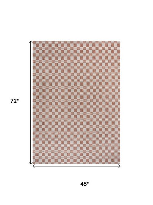 4' X 6' Salmon And Cream Geometric Indoor Outdoor Area Rug