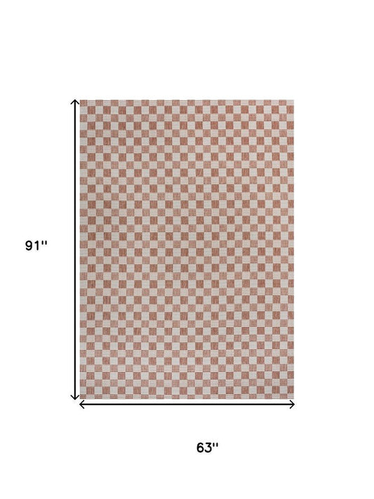 5' X 8' Salmon And Cream Geometric Indoor Outdoor Area Rug