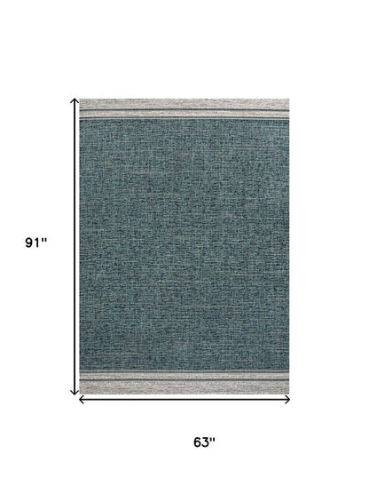 5' X 8' Turquoise And Cream Indoor Outdoor Area Rug