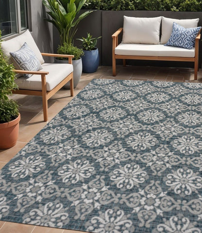 5' X 8' Turquoise And Cream Floral Indoor Outdoor Area Rug HomeRoots
