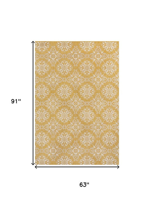 5' X 8' Yellow And Cream Floral Indoor Outdoor Area Rug