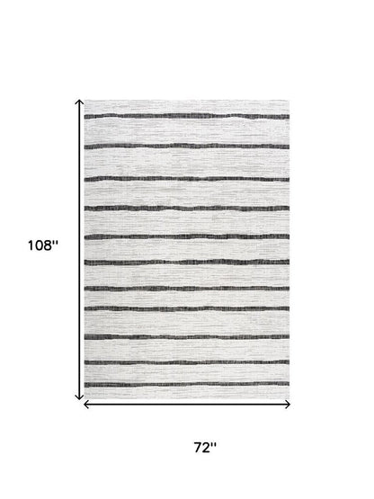 6' X 9' Ivory And Black Striped Indoor Outdoor Area Rug HomeRoots