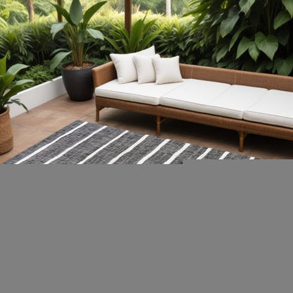 6' X 9' Black And Ivory Striped Indoor Outdoor Area Rug HomeRoots