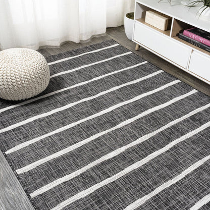 6' X 9' Black And Ivory Striped Indoor Outdoor Area Rug HomeRoots