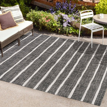 6' X 9' Black And Ivory Striped Indoor Outdoor Area Rug HomeRoots
