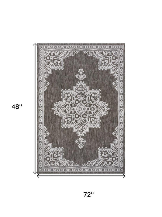 5' X 8' Light Brown And Cream Medallion Indoor Outdoor Area Rug