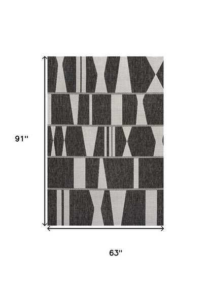 5' X 8' Black And Cream Geometric Indoor Outdoor Area Rug HomeRoots