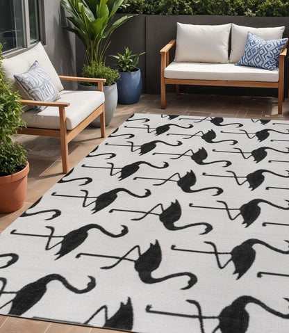 5' X 8' White And Black Animal Print Indoor Outdoor Area Rug HomeRoots