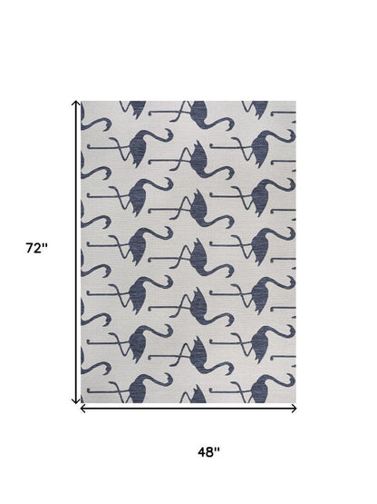 4' X 6' White And Navy Blue Animal Print Indoor Outdoor Area Rug HomeRoots