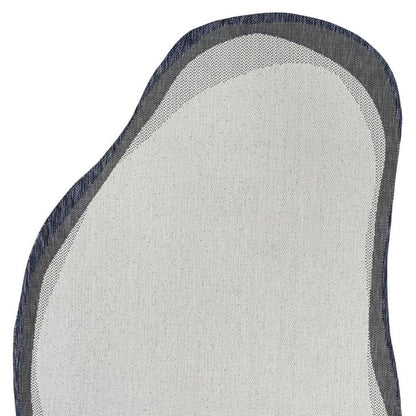 5' X 8' Cream And Navy Blue Abstract Indoor Outdoor Area Rug