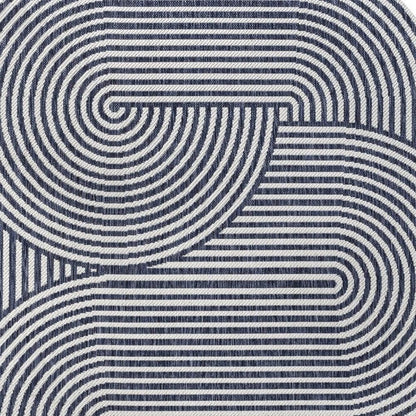 5' X 8' Cream And Navy Blue Abstract Indoor Outdoor Area Rug