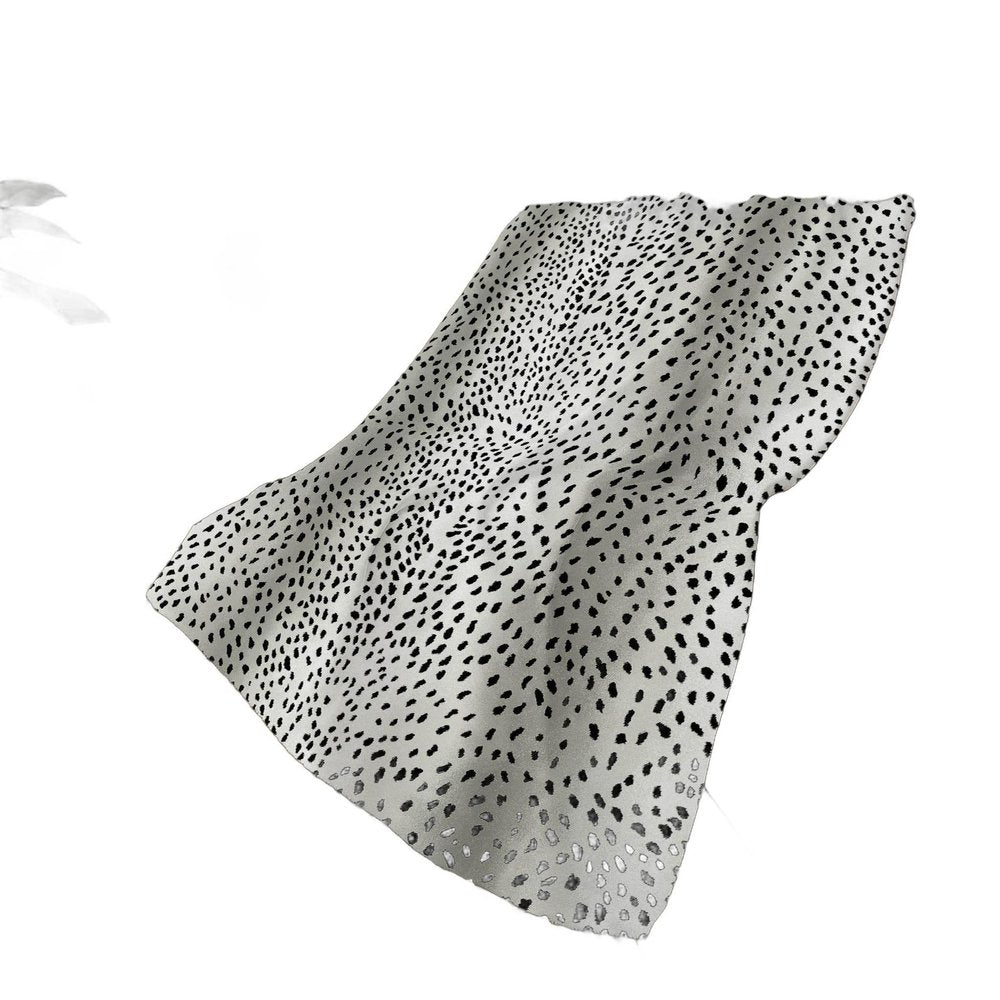 50" X 70" Pearl And Black Animal Print Plush Throw Blanket HomeRoots
