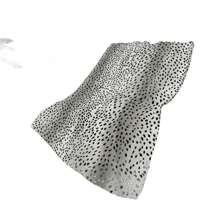 50" X 70" Pearl And Black Animal Print Plush Throw Blanket HomeRoots