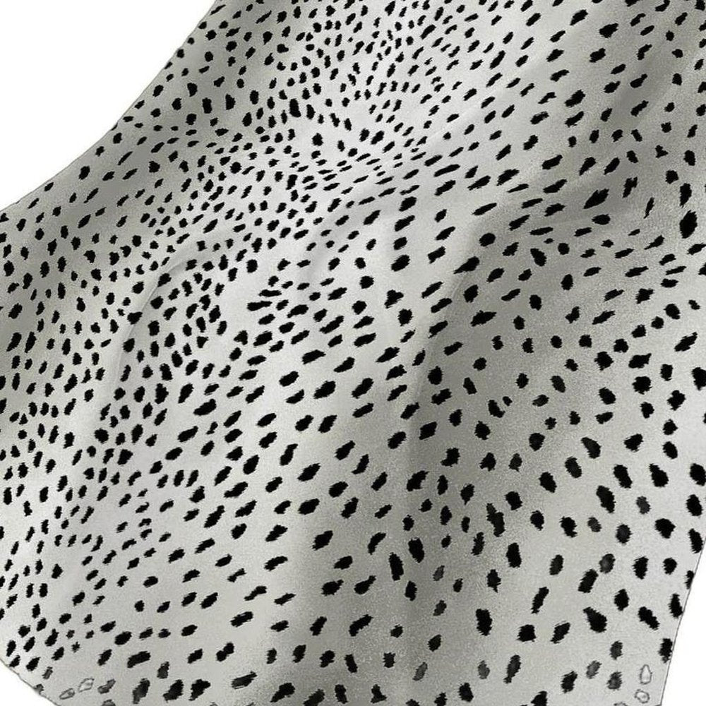 50" X 70" Pearl And Black Animal Print Plush Throw Blanket HomeRoots