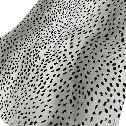 50" X 70" Pearl And Black Animal Print Plush Throw Blanket HomeRoots