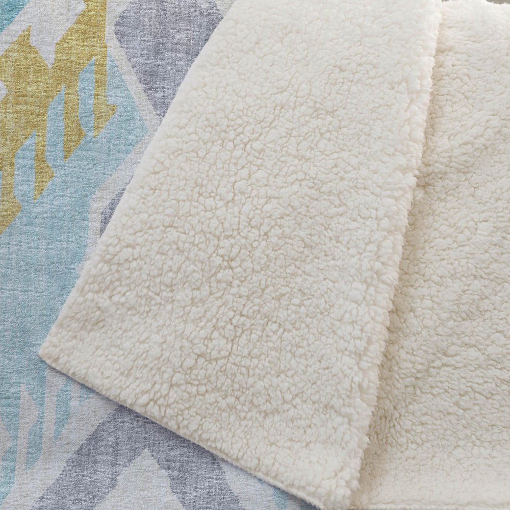 50" X 70" Aqua Gold And Ivory Microfiber Ikat Plush Throw Blanket HomeRoots