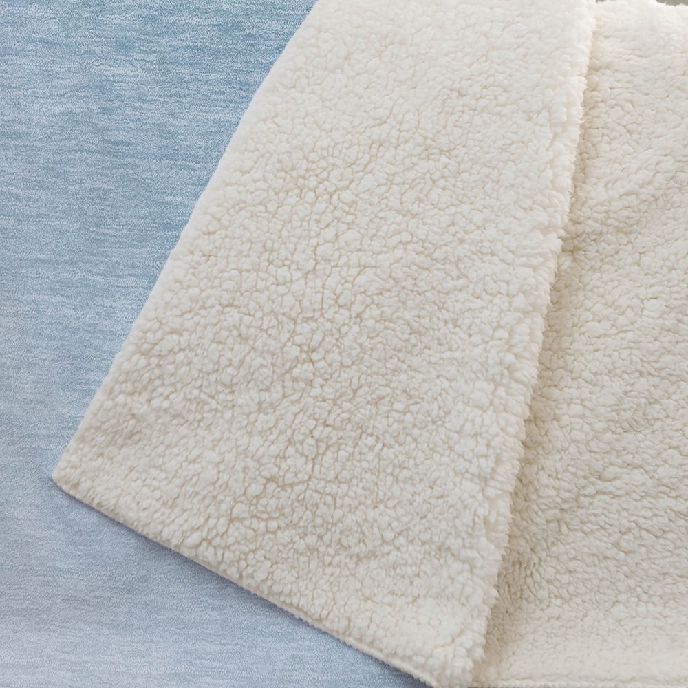 50" X 70" Blue Emerald And Ivory Animal Print Polyester Woven Plush Throw Blanket HomeRoots