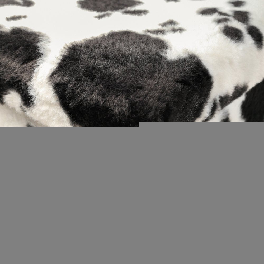 30" Black and White Faux Fur Cow Print Storage Ottoman HomeRoots