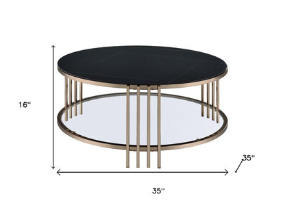35" Black and Champagne Sintered Stone and Steel Round Coffee Table HomeRoots