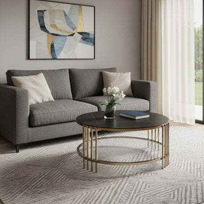 35" Black and Champagne Sintered Stone and Steel Round Coffee Table HomeRoots