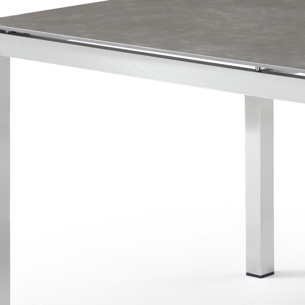 63" Dark Gray and Silver Ceramic Glass and Stainless Steel Outdoor Dining Table HomeRoots