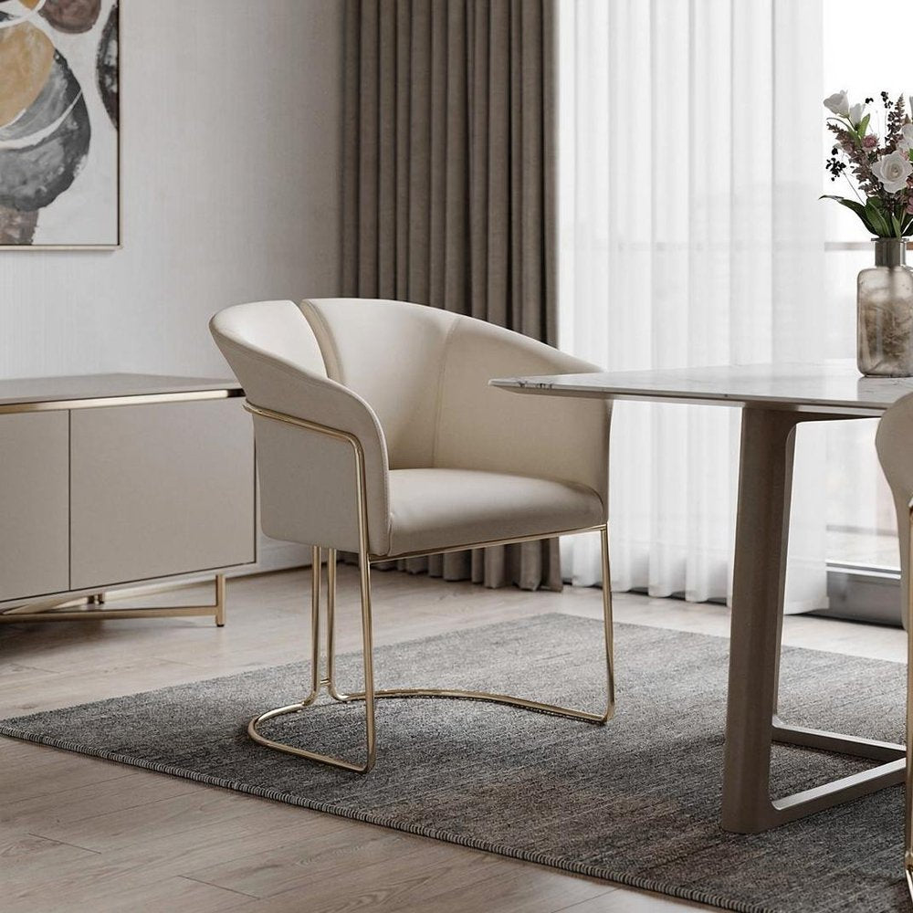 Beige and Gold Faux Leather and Metal Partially Open Back Dining Arm Chair HomeRoots