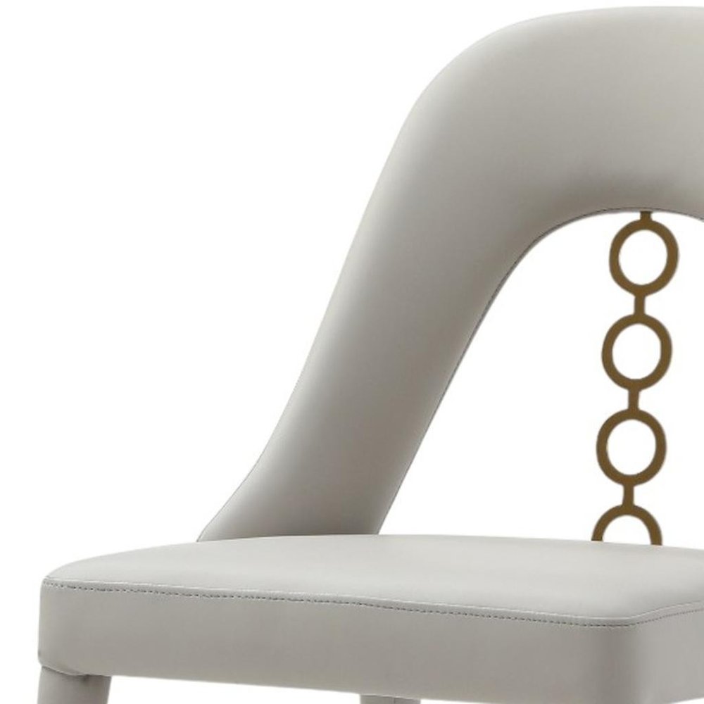 Set of Two Gray and Gold Faux Leather and Stainless Steel Dining Side Chairs HomeRoots
