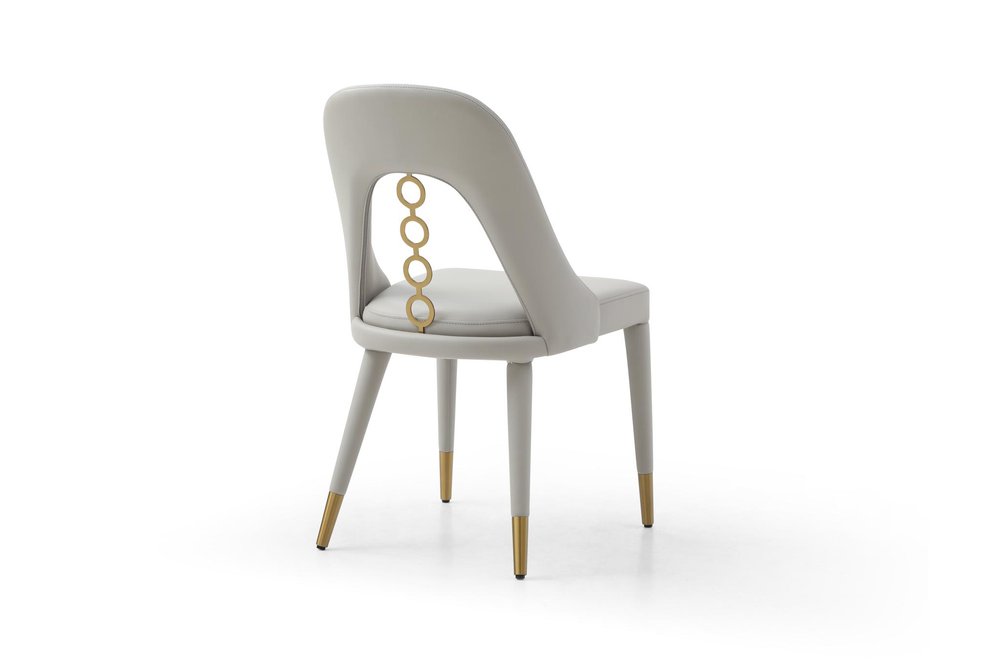 Set of Two Gray and Gold Faux Leather and Stainless Steel Dining Side Chairs HomeRoots