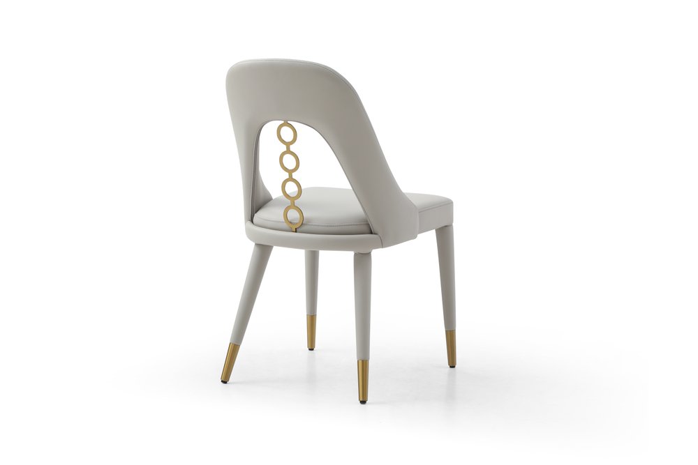 Set of Two Gray and Gold Faux Leather and Stainless Steel Dining Side Chairs HomeRoots