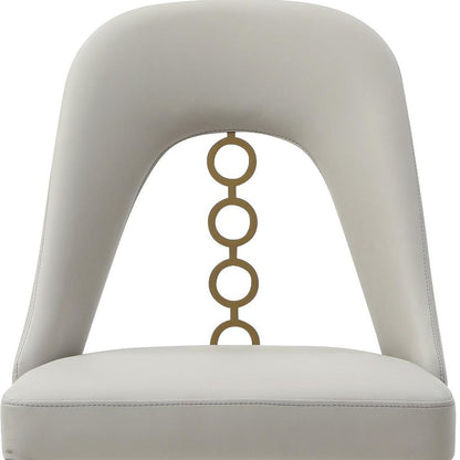 Set of Two Gray and Gold Faux Leather and Stainless Steel Dining Side Chairs HomeRoots
